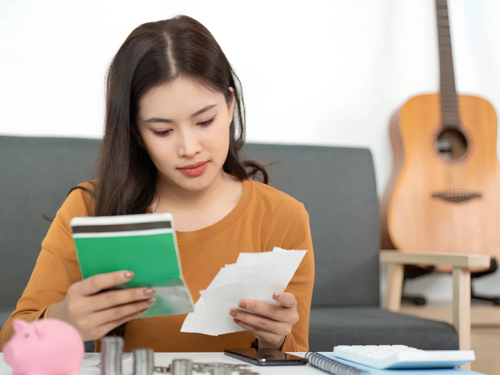Image representing homeowner reviewing roofing budget plan